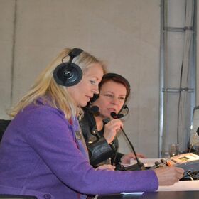 Team interpreting with Margit Schuck and Angelika Erdner in interpreter's booth at TRUMPF